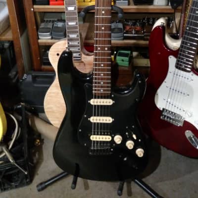 Fender Squier Stratocaster 2014 Black HSS with coil split switch and  black out hardware. image 2