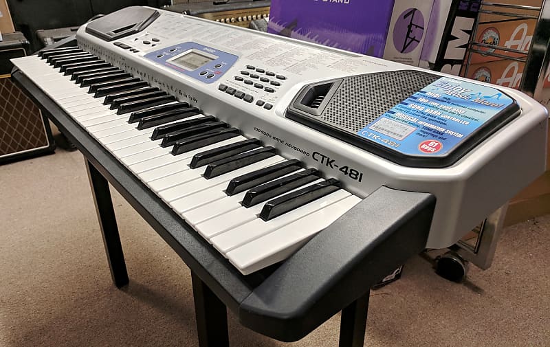Casio CTK-481 61-Key Portable Silver Keyboard, Instructional, 100
