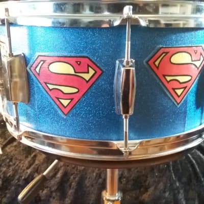 Pearl Export  custom Assaulted Battery two color Superman themed graphics over a blue sparkle wrap. image 2