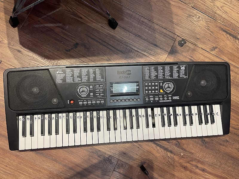 RockJam 電子キーボード RJ-561 譜面台・アダプター付き Amazon.com: RockJam 61 Key Keyboard Piano With LCD Display