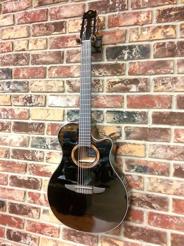 Yamaha NTX700 Black Acoustic Electric Cutaway  Classical Nylon String Guitar image 1