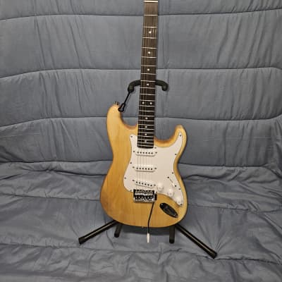 Stadium Electric Guitar NY-9303 Stratocaster-style with a natural finish for sale
