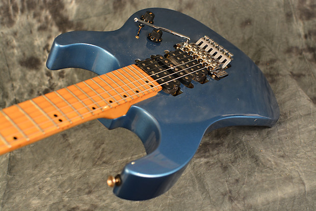Washburn MG-340 1990s Lake Placid Blue HSH Floyd Super Strat