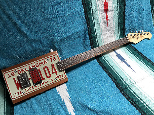 Vintage License Plate Cigar Box Guitar steel bridge humbucker pup alpha pot European neck Reverb Canada