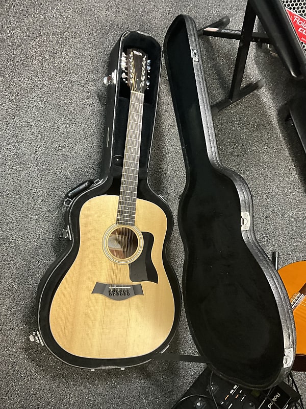 Taylor 150e walnut 12 String acoustic electric guitar made in Mexico 2017-2018 with ES2 electronics in excellent condition with original taylor deluxe hard case and case candy . image 1