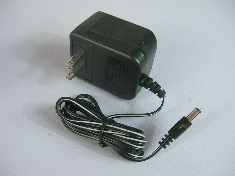 Power supply Roland AX-7  MC-303 Boss SP-202 compatible  9 Volt 9VDC  1000mA 1AMP AC Adapter image 1