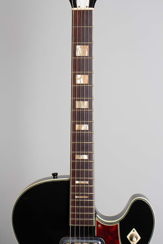 Harmony Meteor H-70 Arch Top Hollow Body Electric Guitar (1963), ser.  #1311H70, original blond two-tone chipboard case.