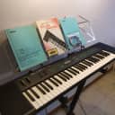 Yamaha DX27S FM Synthesizer with Speakers, original manuals and cassette included.
