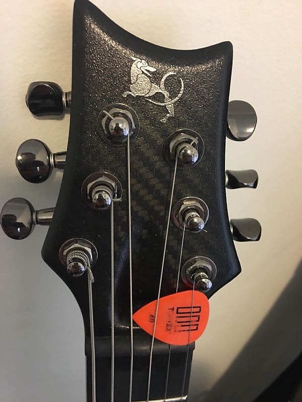X7 Black Opus - Emerald Guitars