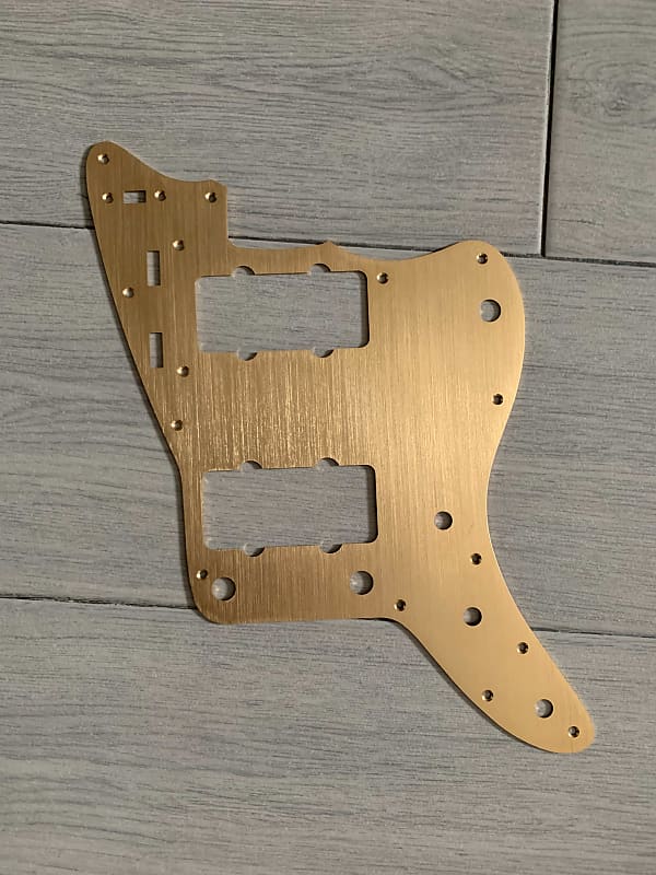 Custom made aluminum pickguard in anodized gold for Fender Reverb UK