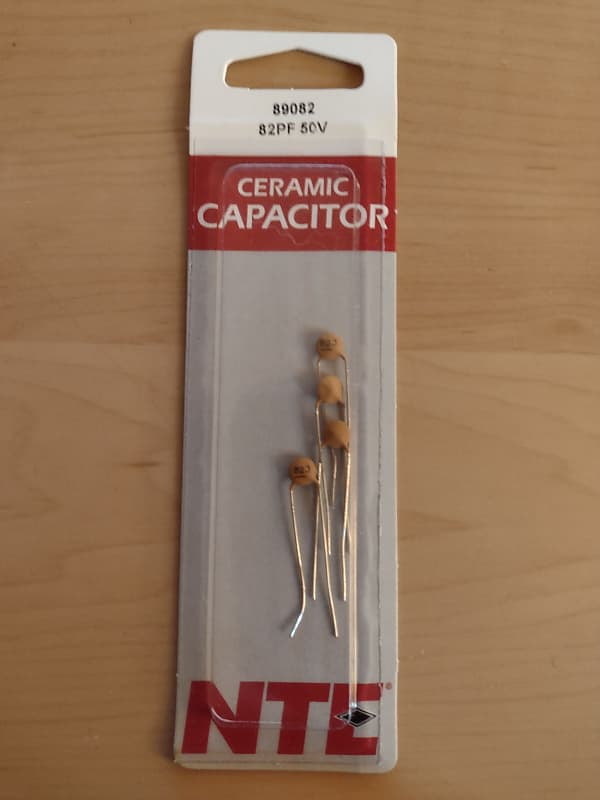 (x4) NTE Capacitors 82pf 50V 10 Radial Lead Part89082 Reverb