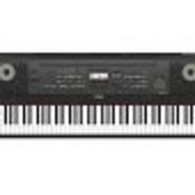 Yamaha DGX-670 88-Key Portable Digital Grand Piano with Speakers (Black)