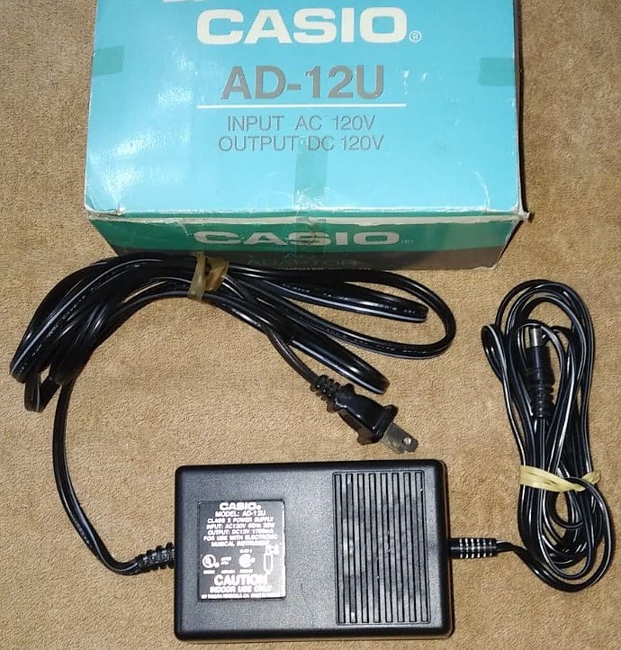 Casio AD-12U ac/dc adaptor 12v 1700mA (-)neg center/ (+)pos | Reverb