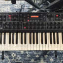 Dave Smith Instruments Prophet 08 PE 61-Key 8-Voice Polyphonic Synthesizer 2009 - 2015 - Black with Wood Sides