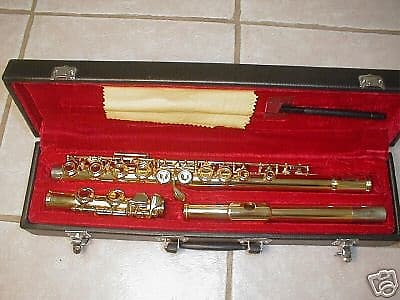 Gold color  flute with case. image 1