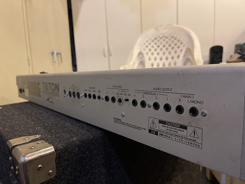 Triton workstation/sampler 61 keys Reverb