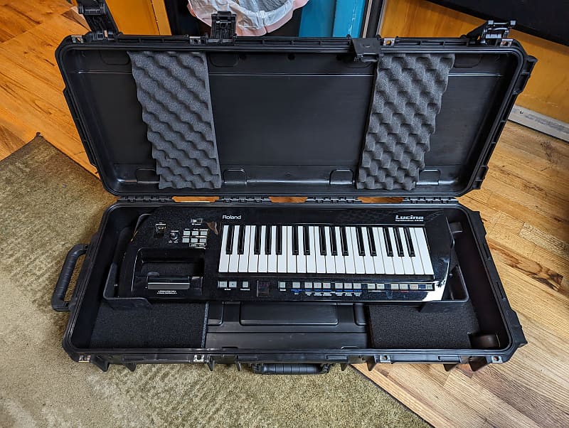 Roland AX-09 Lucina 37-Key Keytar Synthesizer w/SKB Cases