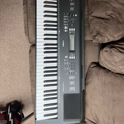 Yamaha PSR F52 Portable Keyboard Deluxe Bundle