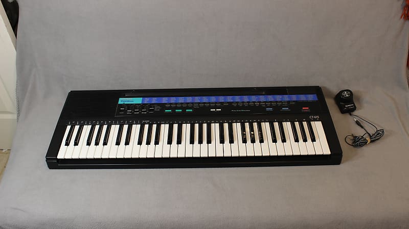 Casio CT-615, 210 Sound Tone Bank Electronic Keyboard and Stand