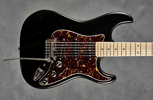 Black strat tortoise shop pickguard maple neck