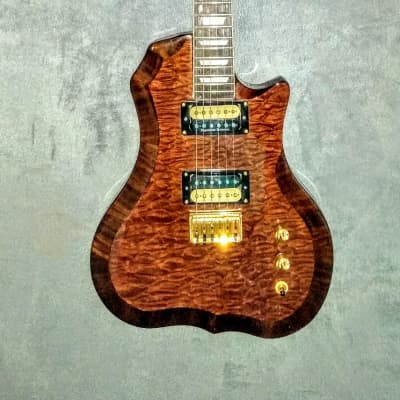 Occhineri Custom Guitar. Waterfall Mahogany image 1