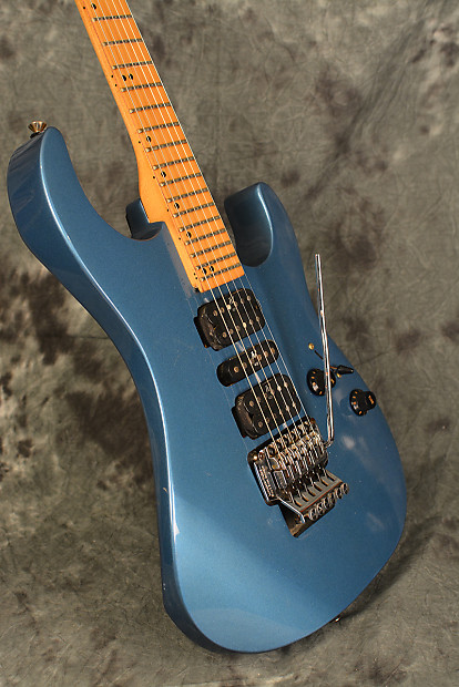 Washburn MG-340 1990s Lake Placid Blue HSH Floyd Super Strat