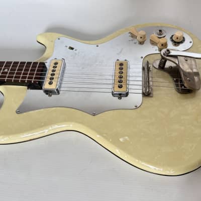 Isana solidbody guitar 1960s - pearloid vinyl image 16