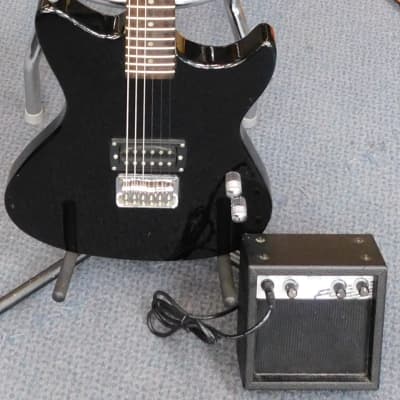First Act ME431 Electric Guitar + First Act Battery Powered Practice Amp + Cable - Black for sale