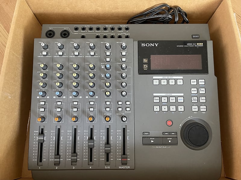 Sony MDMx4 MKII multitrack recorder and two Audiotechnica Reverb