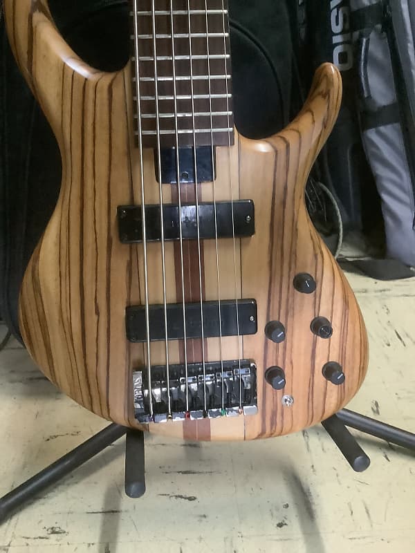 Tobias Basic: 6 string bass guitar Early 90s Zebrawood | Reverb