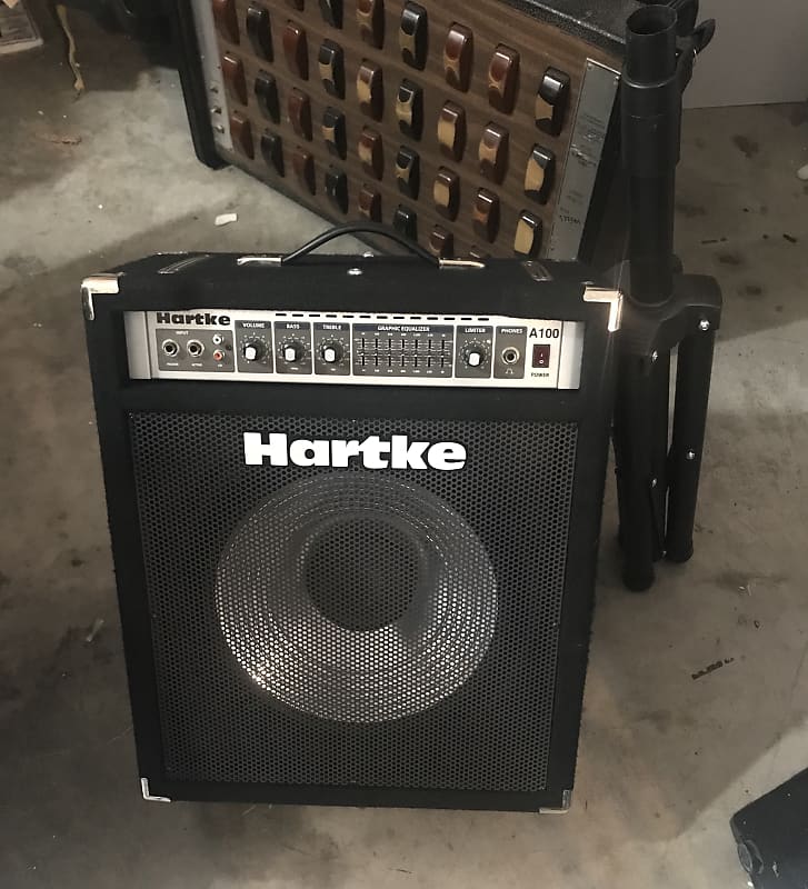 Hartke A100 100 watt Bass amp w/ 15” speaker, limiter, EQ, effects loop,and  XLR output. Like new with speaker stand.