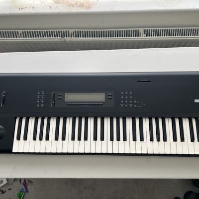 Korg M1 61-Key Synth Music Workstation 1990's - REFURBISHED!