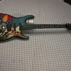 Vintage Rockster Solid Body Electric Guitar with Spiderman? Kick Axx on it's Front as-is image 1