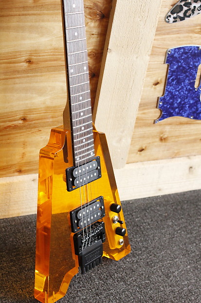 Headless 6 string guitar, Orange Lucite, Overlord of Music