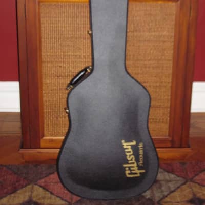 lightly used genuine Gibson Dreadnought Hardshell Case from 2017 - Black Tolex Exterior, Wood Construction, Black Plush Padded Interior, Gold Colored Hardware, lid has Gibson Acoustic Logo, fits square or round shoulder dreadnought (NO guitar included) image 1