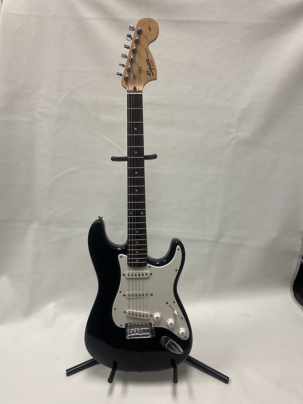 INDONESIAN SQUIER STRATOCASTER - BLACK/WHITE | Reverb