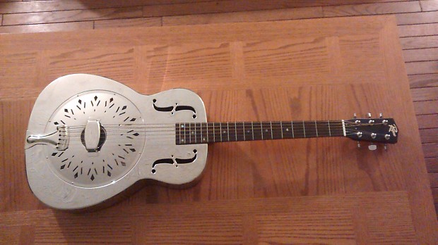 Rogue classic brass body resonator guitar top