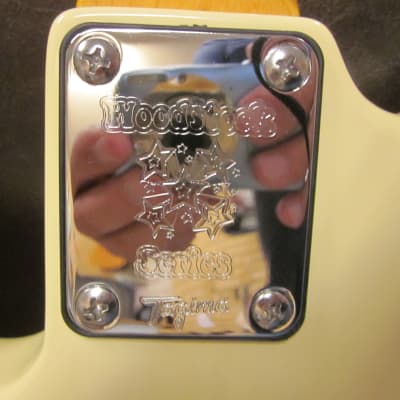 Tagima Woodstock 73 electric bass in  vintage white image 4