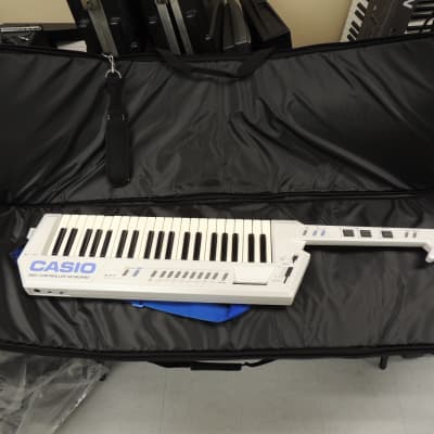 very rare Casio AZ-1 1986 Pearl White Keytar - w/velocity & channel  aftertouch! | Reverb