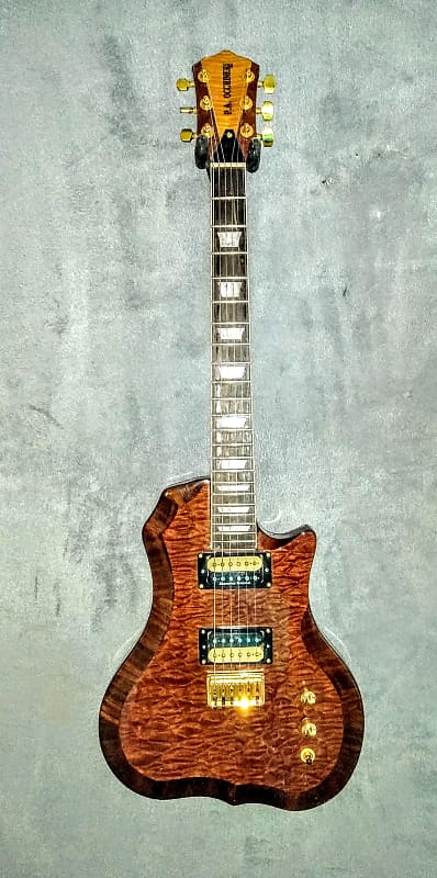 Occhineri Custom Guitar. Waterfall Mahogany image 1