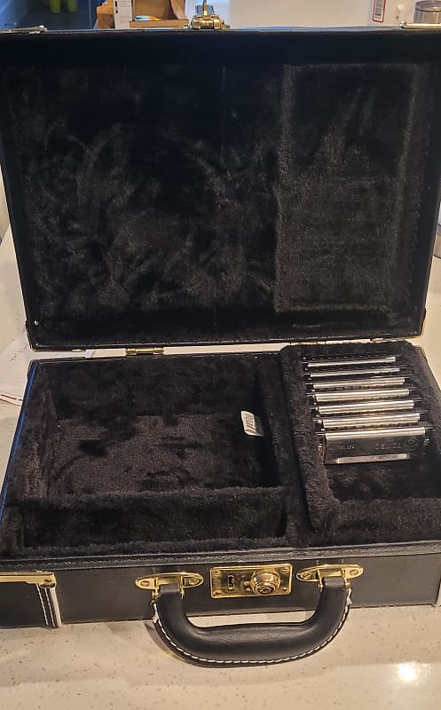 Seven Lee Oskar Harmonicas with case and holder | Reverb