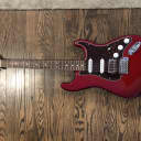 Fender  Fender Special Edition Standard Stratocaster HSS Pau Ferro Fingerboard Candy Red Burst with seymor duncan pickups and a chrome humbucker