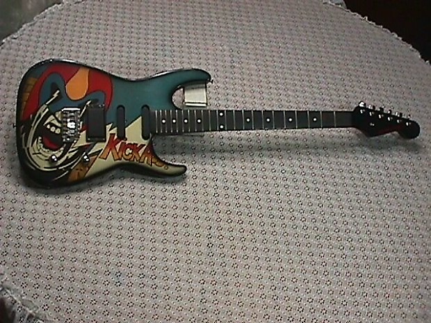 Vintage Rockster Solid Body Electric Guitar with Spiderman? Kick Axx on it's Front as-is image 1