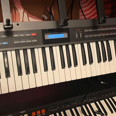 Roland Alpha Juno-1 49-Key Programmable Polyphonic Synthesizer