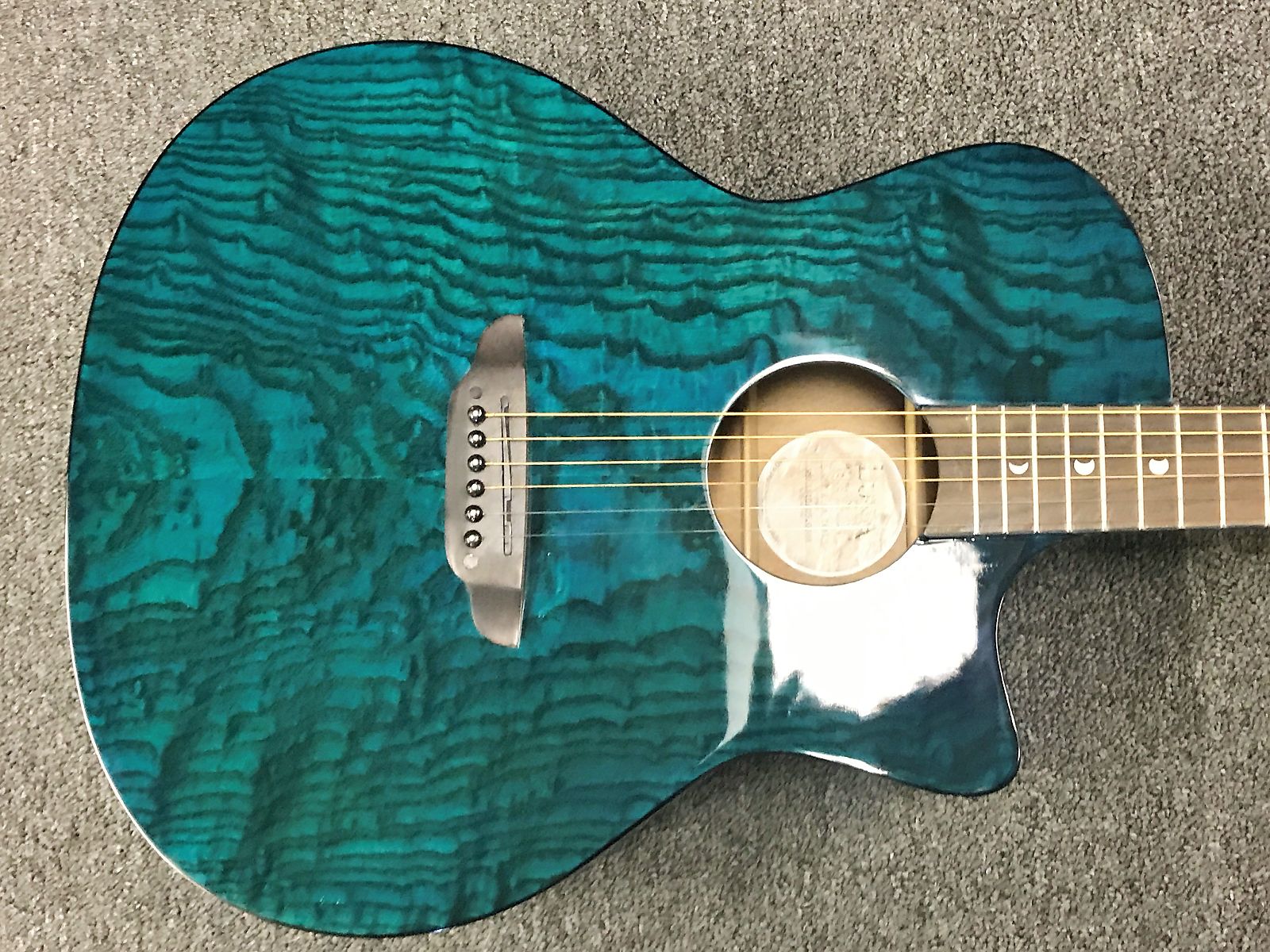 Teal acoustic shop guitar