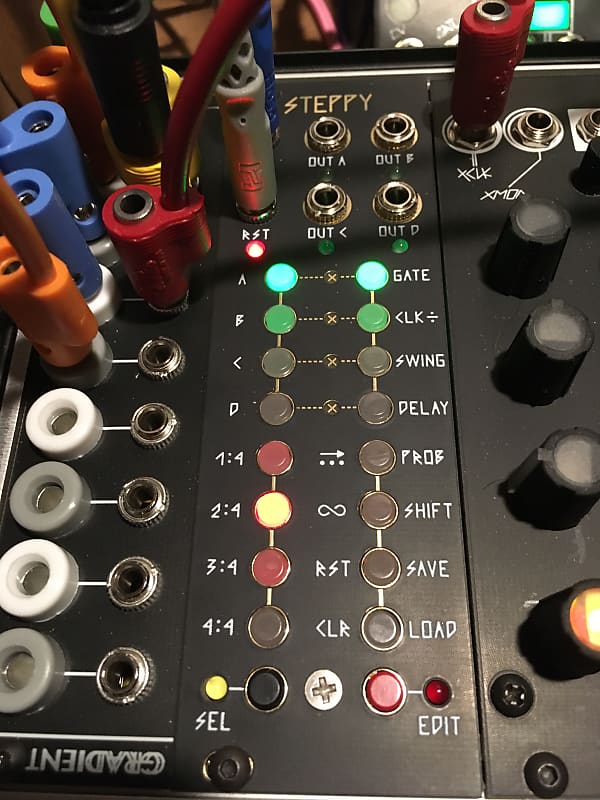 Intellijel Steppy 3U Bkm panel and original.