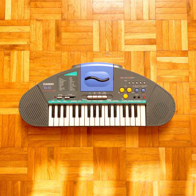 Casio TA-10 (made in Japan in 1992) Mini Toy Keyboard Synthesizer