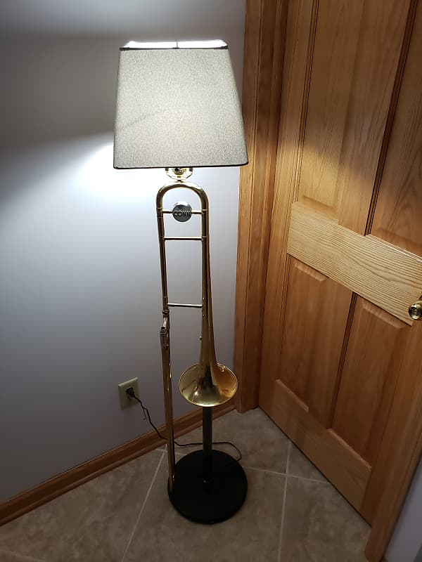 Trombone floor store lamp