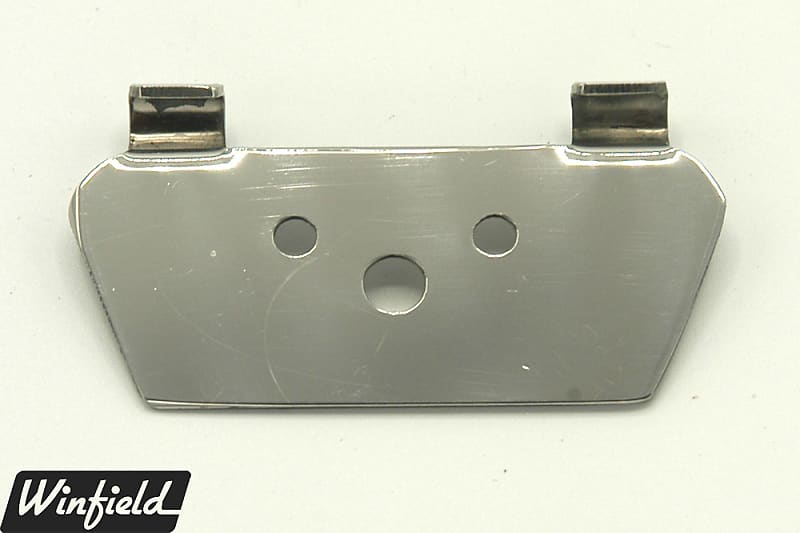 The original adapter bracket to swap Rickenbacker R tailpiece for trapeze