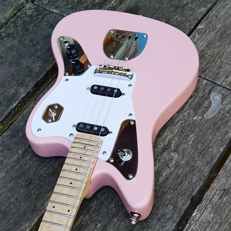 Fanner Guitar Works Ocelot Electric Ukulele. Pink with Maple neck